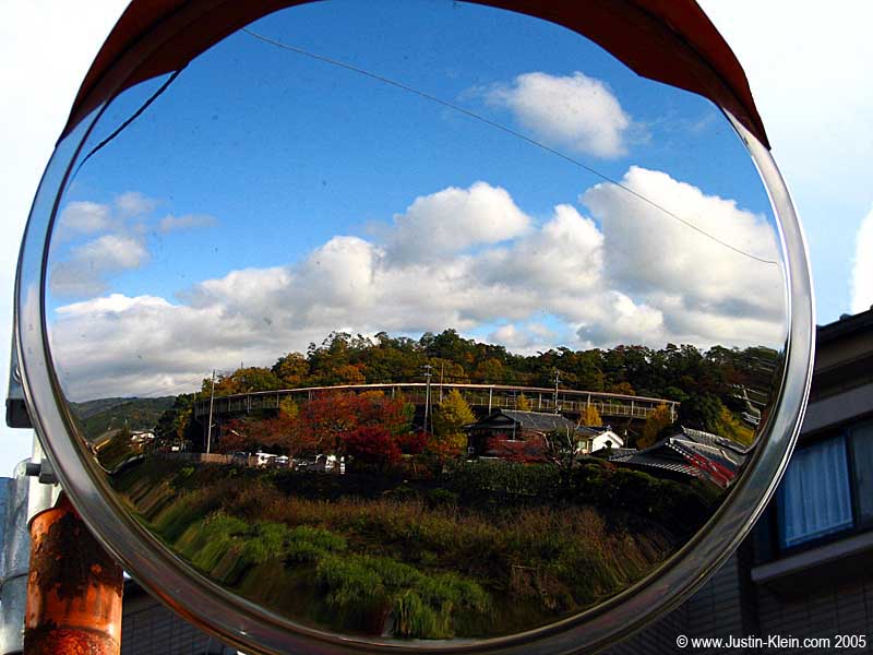 Backing up a bit farther, a reflection of Kyoto this autumn.