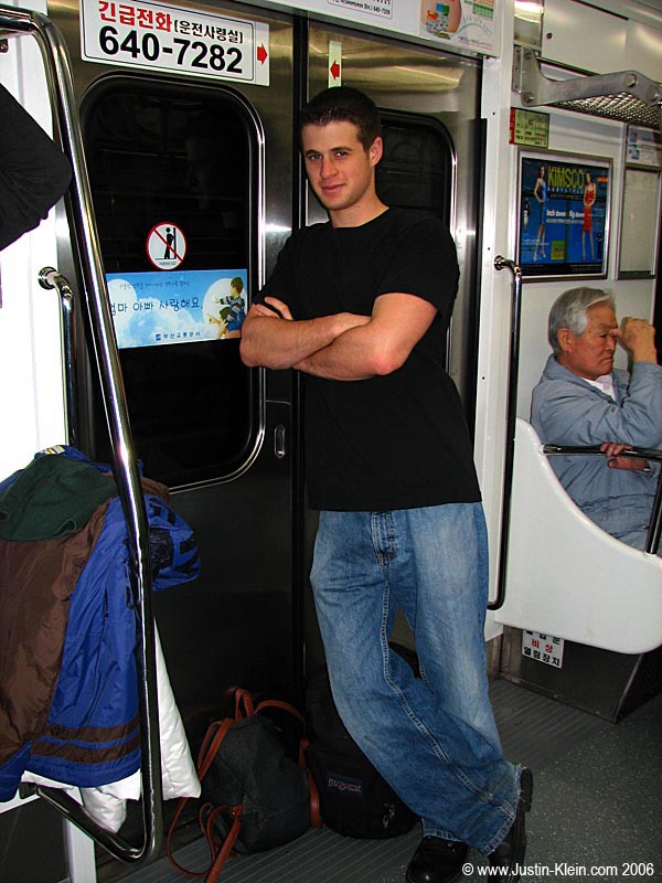 Huh huh, I'm a jerk. (Please observe the sign on the door next to which I'm leaning)