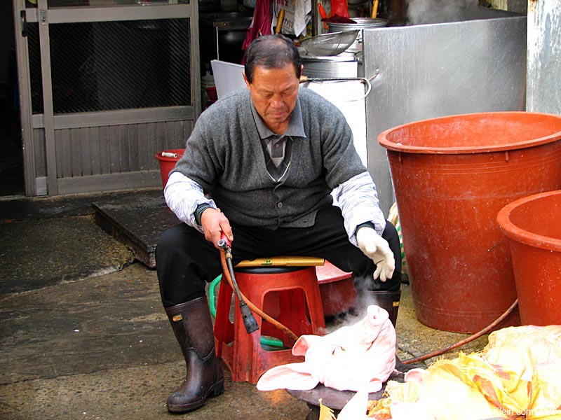 Here's our good buddy again ensuring the quality of his products...BY DOUSING THEM WITH A BLOWTORCH