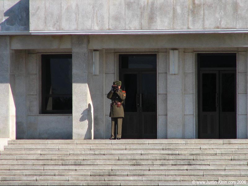 Looks like the observation towers aren't quite as distant as I thought.  A real-life North Korean communist soldier.  Within eyesight and earshot. 