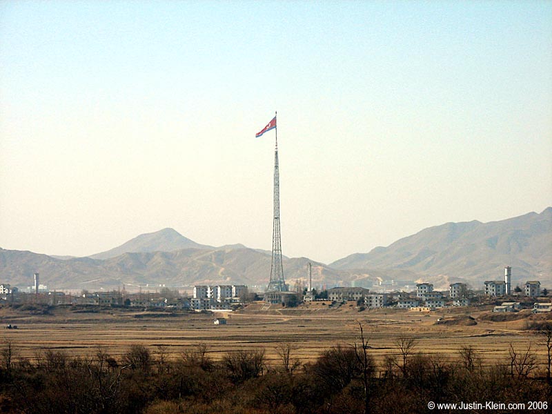 The world's largest flag proudly marks Propaganda Village. 