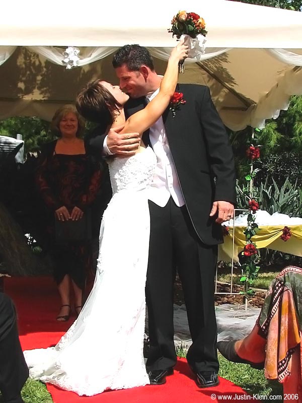 "You may now kiss the bride." Yep, I'm fully aware of how messed up the exposure is.  Oops. 