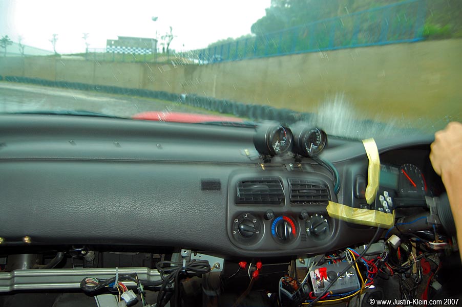 Inside my new friend's shell of an Impreza - with most of the dashboard and its internal components stripped away.