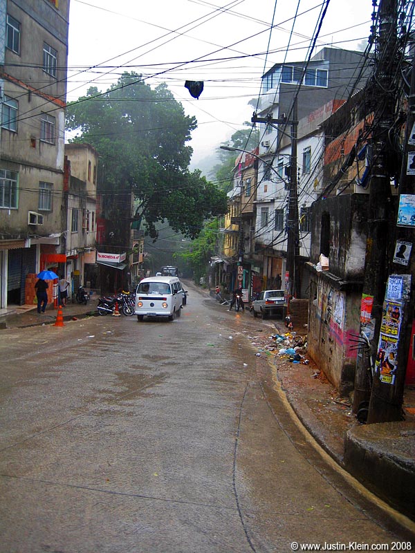 A "proper" road through Rocinha.  Just don't deviate - you'll quickly get lost in the tiny, twisting, turning alleys formed each time another small house pops up in an available spot. 