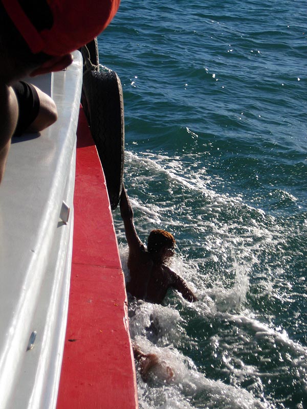 A kid who thought it would be fun to jump off the moving ferry and drag himself in the water for the last few minutes of the ride. 