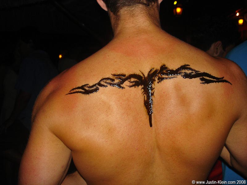 Here's what happened after only a few minutes of partying in the South American humidity. He tried to clean up the drip by making a design out of it, but it just kept getting worse.