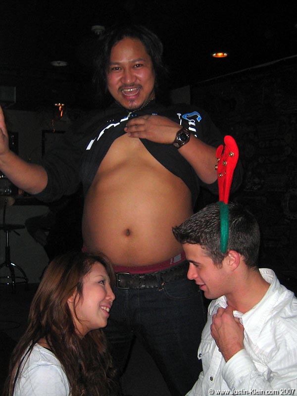 Nikki showing off that impressive bartender-belly behind Natsumi and I. 