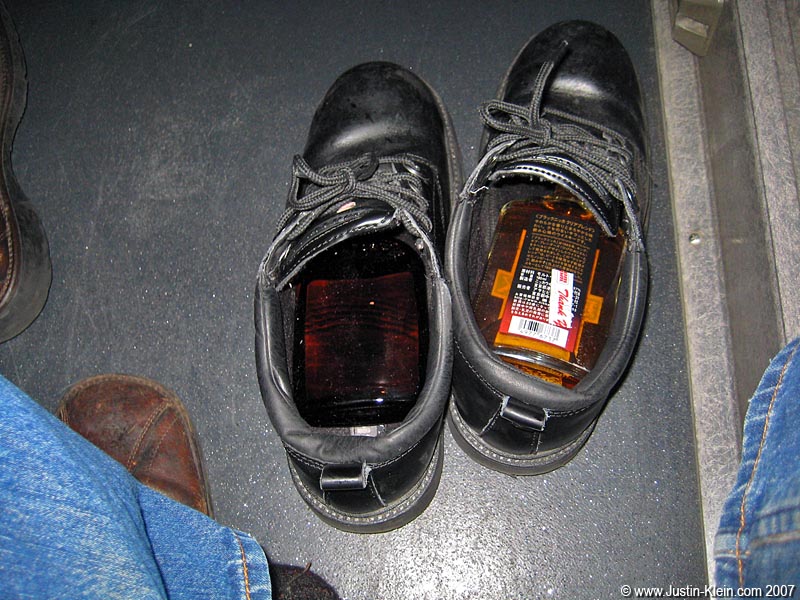 Peder thought I was <i>insane</i> for loosening my shoelaces and walking with two glass bottles under my feet. But I assured him that it would just be for a few seconds; I'd take them out as soon as we were onboard : )
