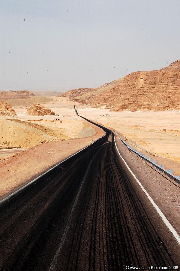 A lonely road into the Egyptian desert.