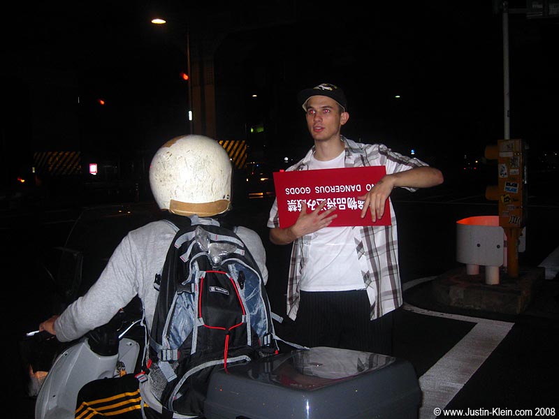 This is not HousePartyGuy. This is just a very drunk, but very amusing foreigner we met while walking from Shibuya to Roppongi on Friday night. He decided to join up with our group on its quest for fun. ...And to protect us from Dangerous Goods.