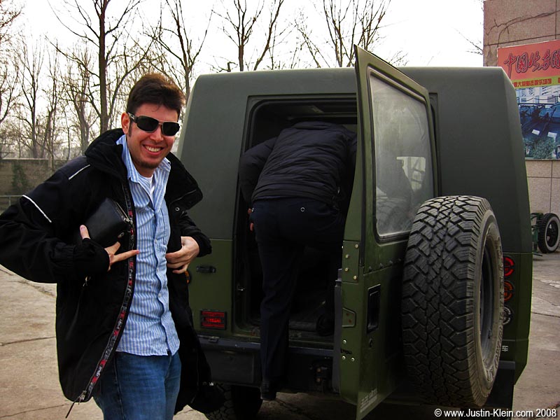 Riding a little army vehicle from the visitor's center out to the range itself. 