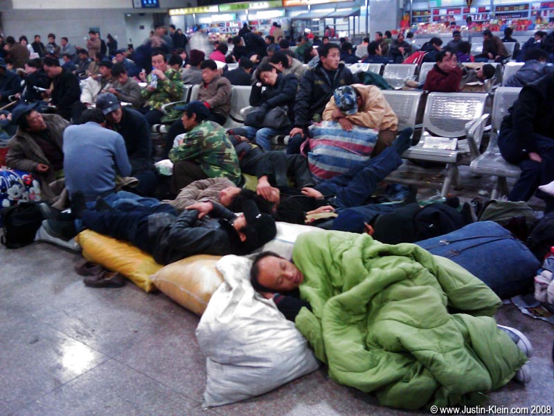 In the station's waiting room, piles of luggage and passed-out humans were scattered <i>everywhere</i> - so densely that it in many spots, it was nearly impossible to walk!