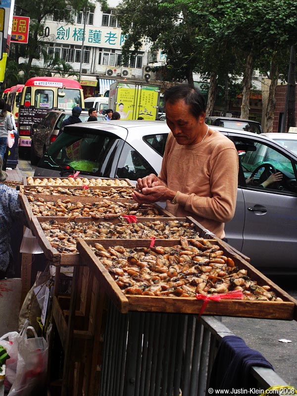 Selling dried mussels. 