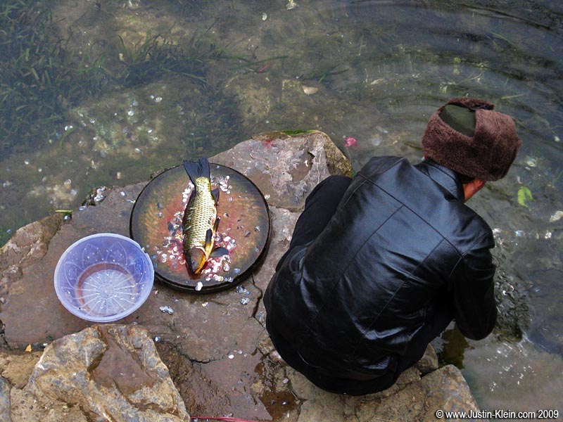 Preparing the catch of the day.