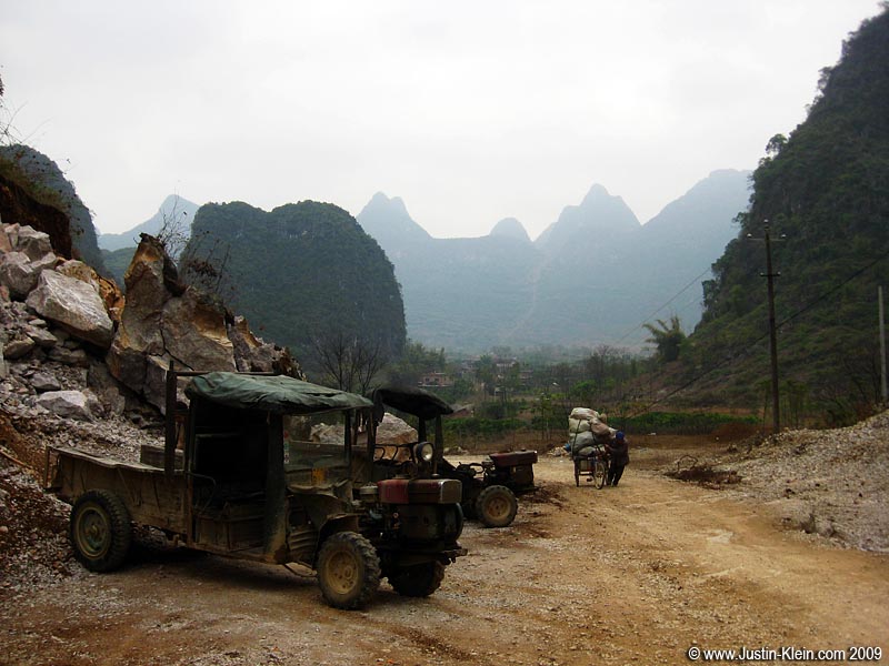 The offroad version of the "engine-out-front" tractors have four wheels instead of three. 
