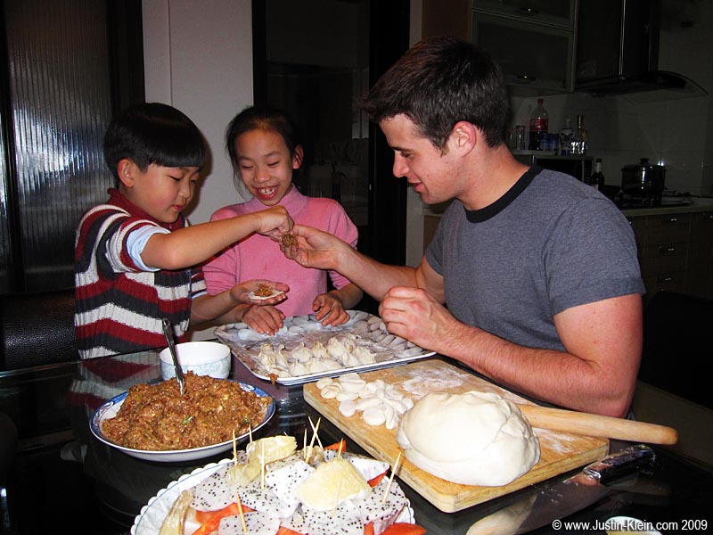 Making jiaozi with Junior and his cousin.