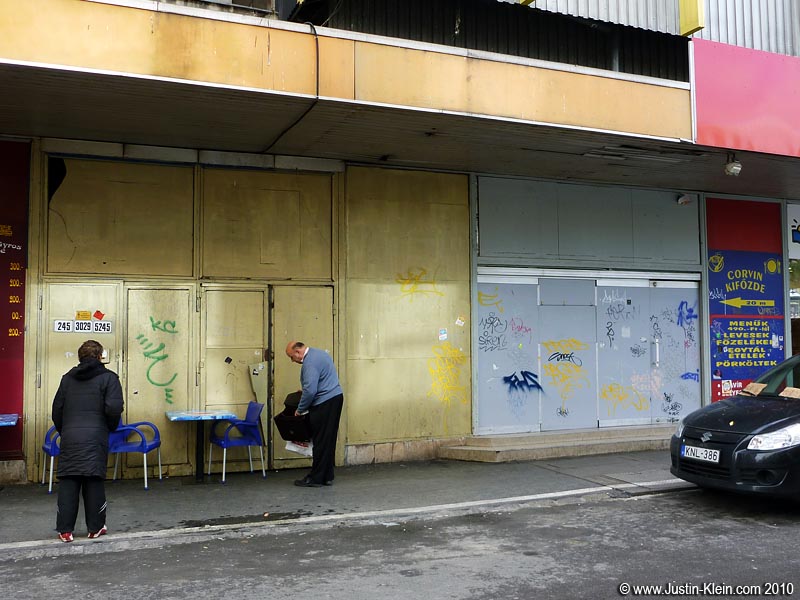 The staircase up to Corvintető resides just inside those inconspicuous yellow doors. Talk about "underground"..