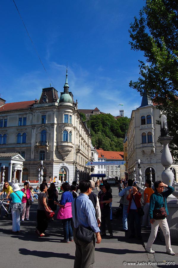 Looking towards the Old Town district and Ljubljana Castle from Prešernov trg.  Perhaps I should've waited until that Chinese tour group wasn't right in the middle of the photo : P