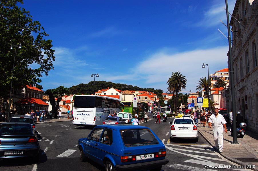 Just outside the old city gates, a constant influx of tour buses and taxis.