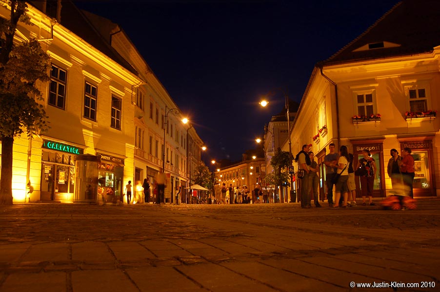 Groups of locals gathering in Town Square.