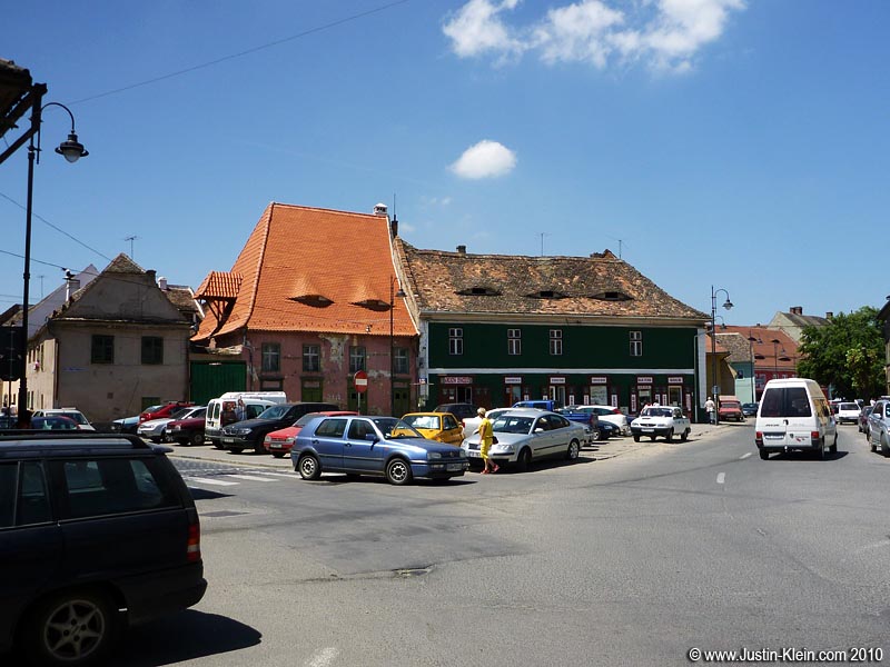 Sibiu's most noteworthy characteristic: its windows. They look just like squinty eyes peering down on you. And strangely, they seem to be completely unique to the city: although nearly every building in Sibiu had them, we didn't see even one such window throughout the rest of our trip - in Romania or elsewhere.