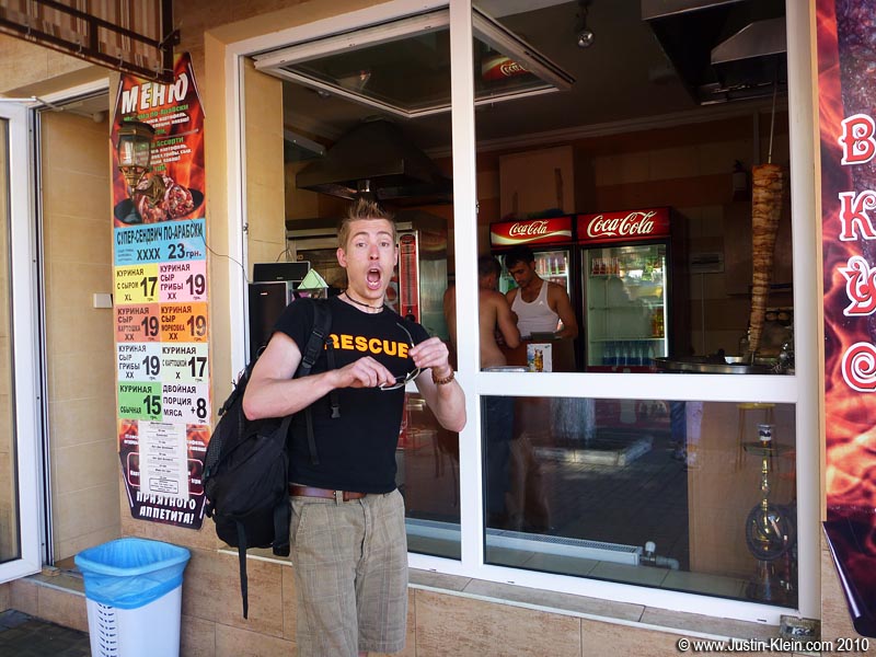 What's up with Peder's expression, you ask? Well, this particular afternoon was hot - <i>really</i> hot - and inside the shawarma shop was even hotter.  I wouldn't have been surprised if it was over 50 degrees in there.  Peder's expression is him gasping for air after having braved the fires of hell for the few minutes it took to place an order. I have no idea how that guy who works in there still remains in solid human form; I would've thought he'd have evaporated ages ago.