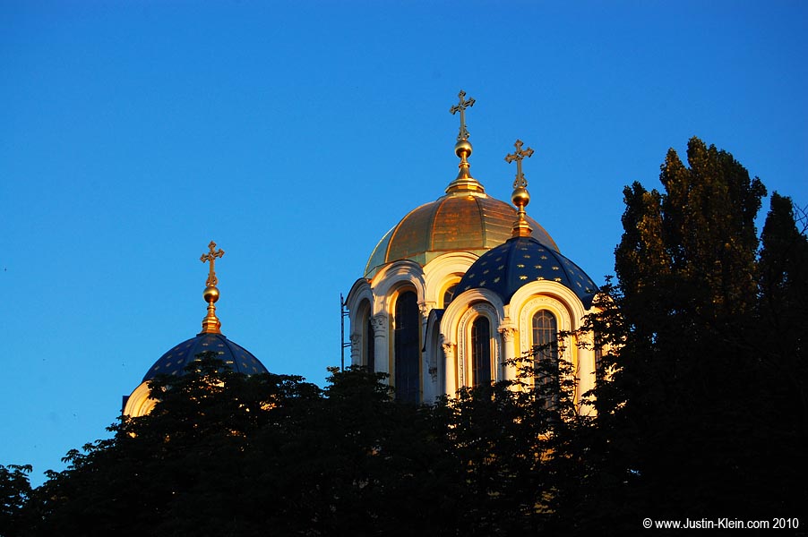 St. Volodymyr's Cathedral peeks out at the setting sun.