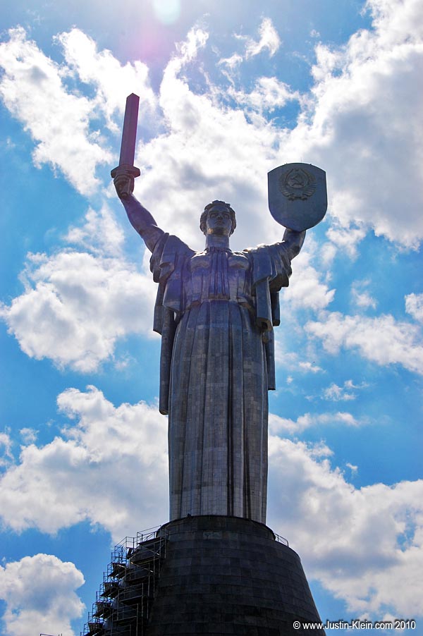 Statue of Liberty?  Not exactly...that's a sword, not a torch.
