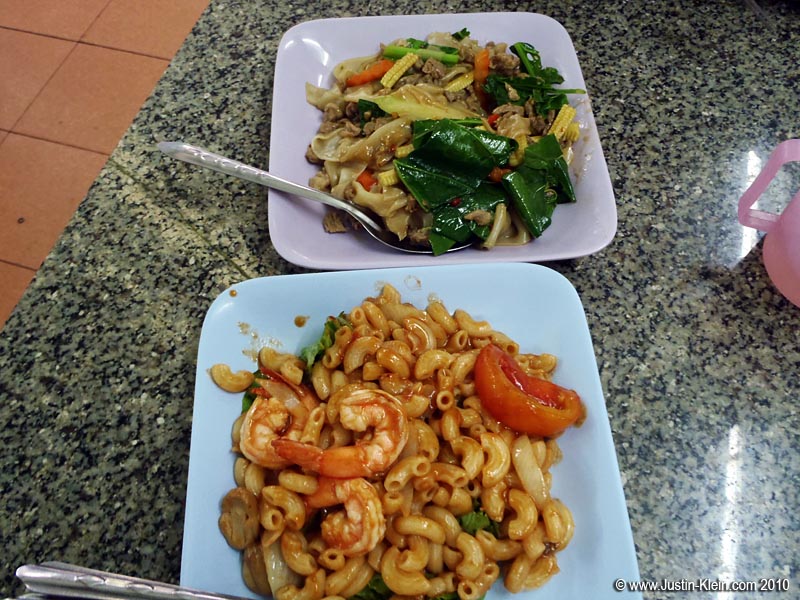 Chicken with broad noodles and some kind of shrimp macaroni.