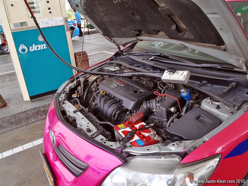 How to refuel a compressed-gas engine.