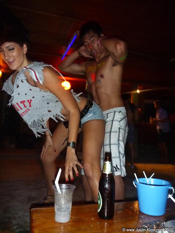 A Kiwi stripper from our bungalow teaches Herb some of her moves.
