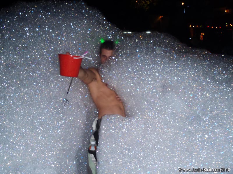 Engulfed by the foam.