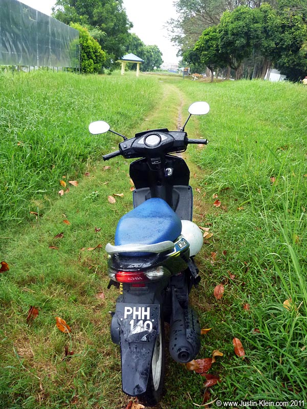 Pulling off the road to change from jeans into boardshorts. With unpredictable showers, soggy wet denim didn't sound like a particularly fun proposition.
