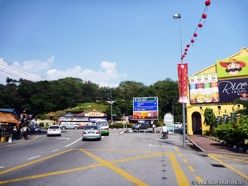 Heading towards Bukit China.  Don't ask me what Mario's doing on that billboard : P
