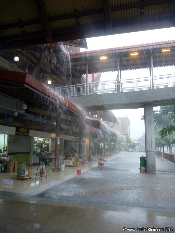 ...And as I learned the hard way, a Singaporen a drizzle is rarely <i>just</i> a drizzle.