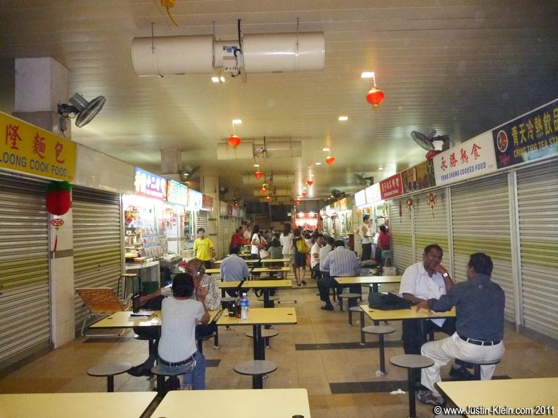 Inside, Hawker Centers are essentially collections of individual food counters that share communal tables.  Grab a meal from one and a glass of fresh-squeezed juice from another - they provide a great way to sample all the variety Singapore has to offer.